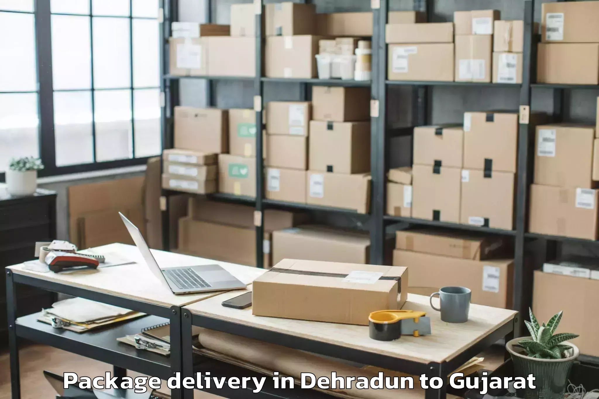 Hassle-Free Dehradun to Jhulasan Package Delivery